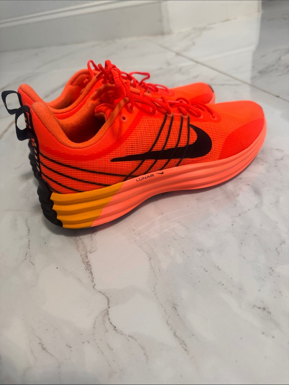 Nike Women’s Bright Orange and Black Running Sneakers